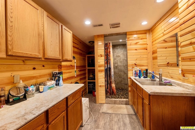 817 S 3rd St, Nebraska City, NE 68410 - kitchen featuring wood walls, light wood finished floors, light countertops, and recessed lighting