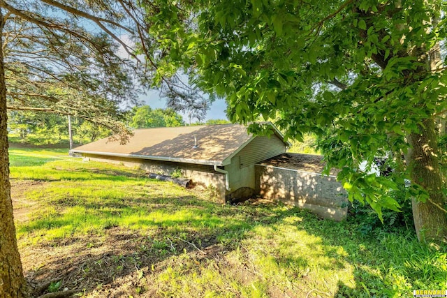 817 S 3rd St, Nebraska City, NE 68410 - view of side of home featuring a shingled roof