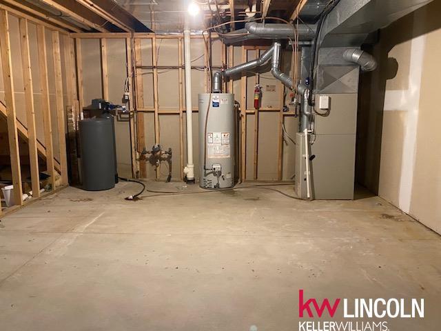 2930 Drawbridge Ct, Lincoln, NE 68516 - unfinished below grade area featuring gas water heater and a water softener system