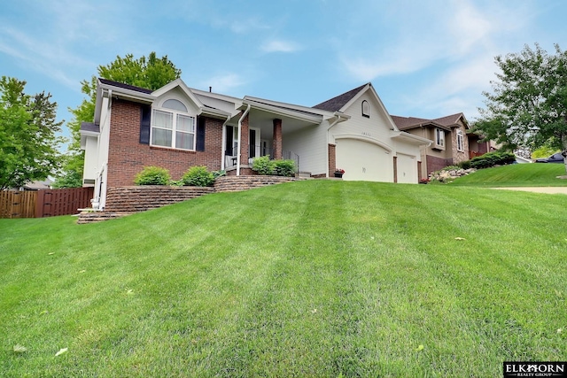 19523 Binney Cir, Elkhorn, NE 68022 - ranch-style house with brick siding and a garage
