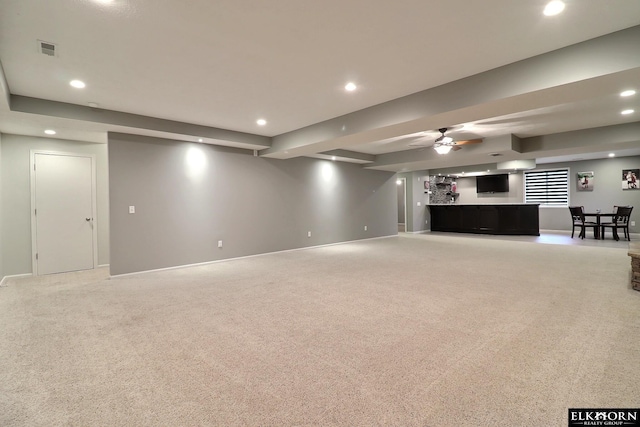 19523 Binney Cir, Elkhorn, NE 68022 - finished basement with recessed lighting, light carpet, bar area, and a ceiling fan