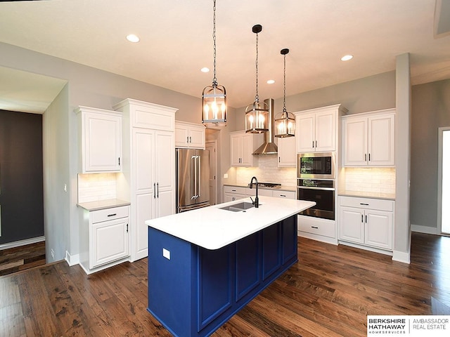 10309 S 102nd St, Papillion, NE 68046 - kitchen with stainless steel appliances, white cabinets, decorative backsplash, and recessed lighting
