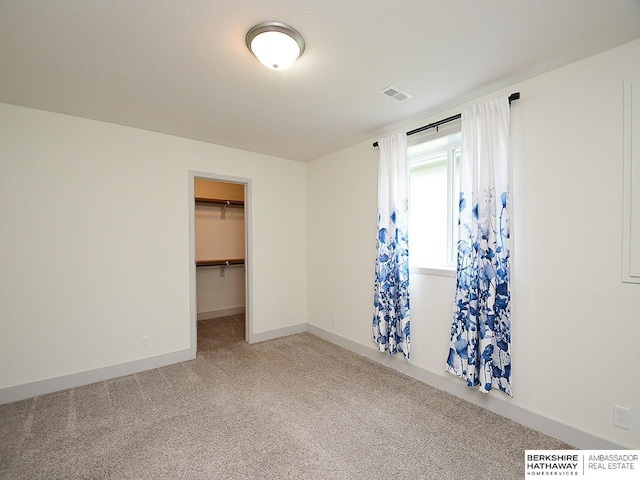 10309 S 102nd St, Papillion, NE 68046 - unfurnished bedroom with light colored carpet, a spacious closet, and a closet