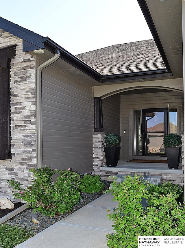 10309 S 102nd St, Papillion, NE 68046 - doorway to property featuring a shingled roof