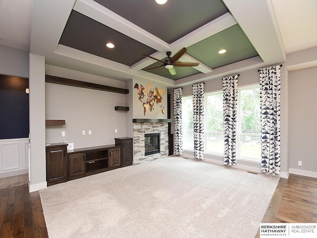 10309 S 102nd St, Papillion, NE 68046 - unfurnished living room with dark wood-style floors, a ceiling fan, a fireplace, coffered ceiling, and recessed lighting