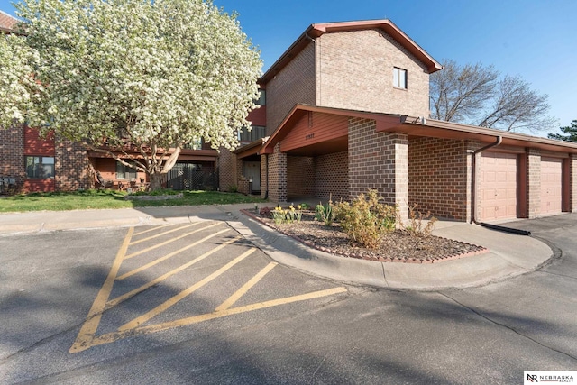 11937 Miracle Hills Dr Unit 11, Omaha, NE 68154 - view of front of house featuring brick siding