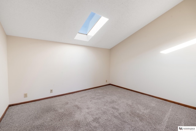 11937 Miracle Hills Dr Unit 11, Omaha, NE 68154 - additional living space featuring a skylight, carpet flooring, and lofted ceiling