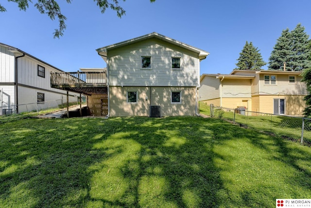 2811 S 36th St, Omaha, NE 68105 - back of house featuring a wooden deck and a fenced backyard