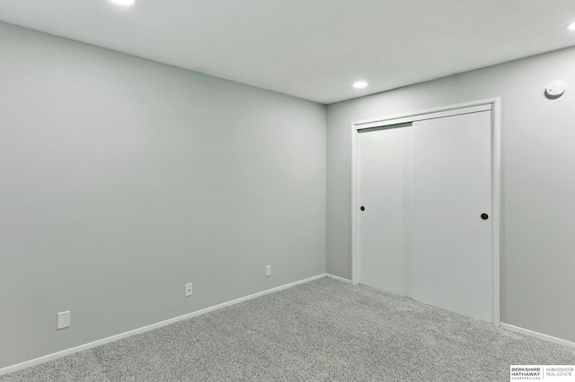 12727 W Dodge Rd Unit 124C, Omaha, NE 68154 - unfurnished bedroom with carpet, recessed lighting, and a closet