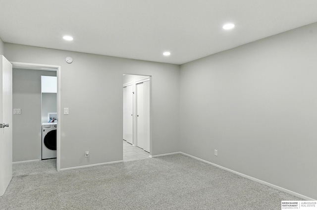 12727 W Dodge Rd Unit 124C, Omaha, NE 68154 - spare room featuring washer / clothes dryer, light colored carpet, recessed lighting, and a smoke detector