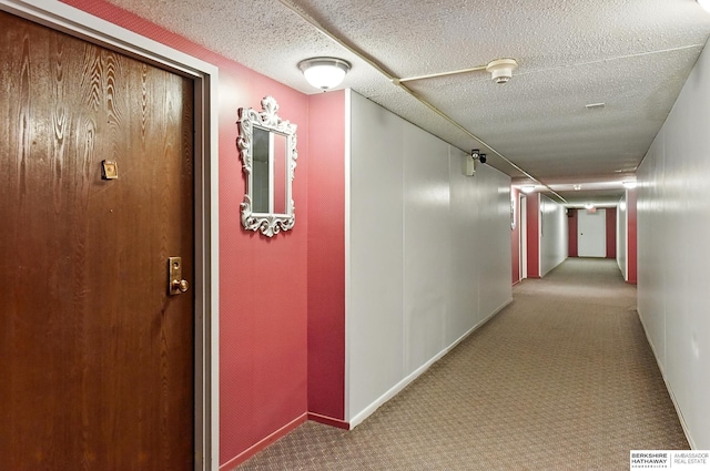 12727 W Dodge Rd Unit 124C, Omaha, NE 68154 - hall with carpet flooring and baseboards