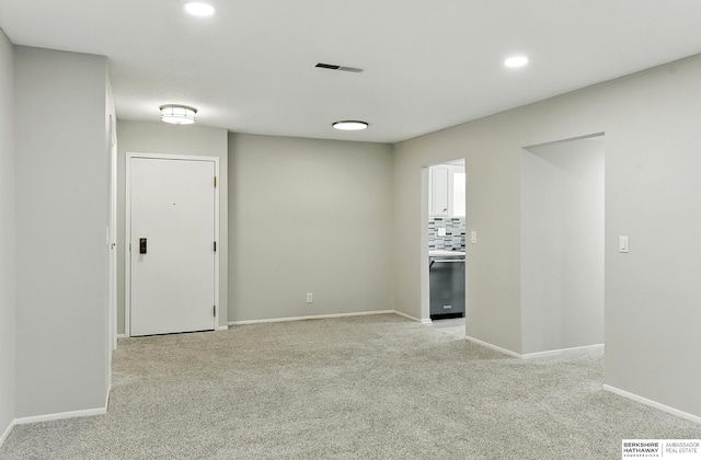 12727 W Dodge Rd Unit 124C, Omaha, NE 68154 - unfurnished room with light colored carpet and recessed lighting