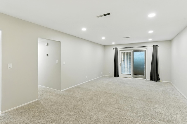 12727 W Dodge Rd Unit 124C, Omaha, NE 68154 - empty room featuring recessed lighting and light colored carpet
