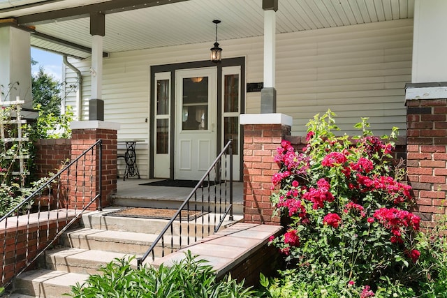 210 W Moravia Ave, Prague, NE 68050 - entrance to property featuring a porch and brick siding