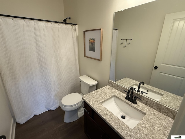 2308 Alexandra Rd, Papillion, NE 68133 - bathroom with wood finished floors, vanity, and a shower with curtain