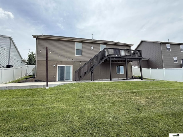 2308 Alexandra Rd, Papillion, NE 68133 - rear view of property with stairs, a wooden deck, a fenced backyard, and a patio area