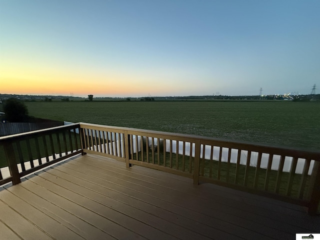 2308 Alexandra Rd, Papillion, NE 68133 - deck at dusk featuring a rural view