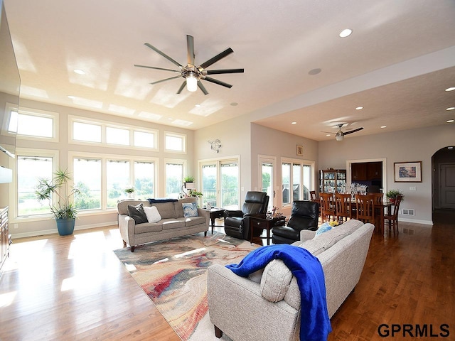 1526 Provencal Cir, Yutan, NE 68073 - living room with ceiling fan, wood finished floors, recessed lighting, and arched walkways
