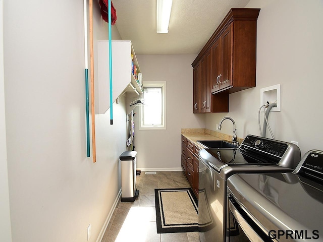 1526 Provencal Cir, Yutan, NE 68073 - laundry room with independent washer and dryer and cabinet space