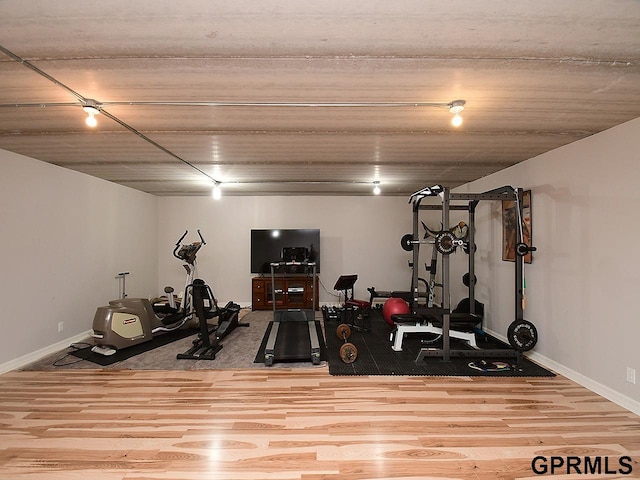 1526 Provencal Cir, Yutan, NE 68073 - exercise room featuring wood finished floors