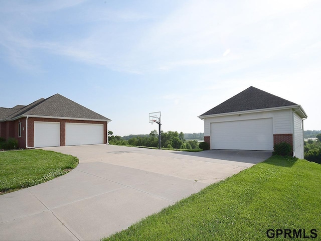 1526 Provencal Cir, Yutan, NE 68073 - view of home's exterior with brick siding, a lawn, and a garage