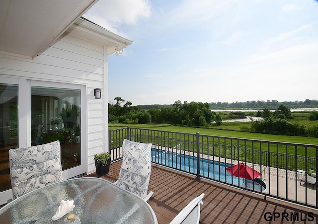 1526 Provencal Cir, Yutan, NE 68073 - wooden deck featuring outdoor dining area and a water view