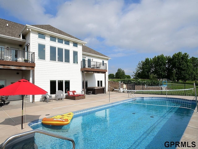 1526 Provencal Cir, Yutan, NE 68073 - rear view of house featuring a balcony, a patio, a jacuzzi, and roof with shingles
