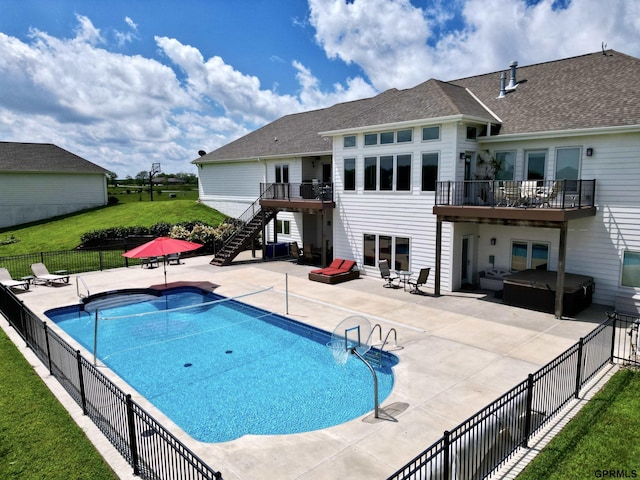 1526 Provencal Cir, Yutan, NE 68073 - view of swimming pool with stairs, a patio, a jacuzzi, and a wooden deck