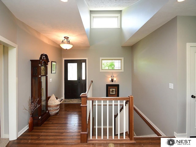 7521 Exbury Rd, Lincoln, NE 68516 - foyer entrance featuring healthy amount of natural light and dark wood-style flooring