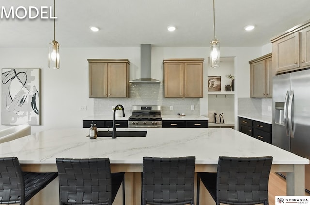 12386 Fenwick St, Papillion, NE 68046 - kitchen featuring wall chimney range hood, stainless steel appliances, tasteful backsplash, hanging light fixtures, and recessed lighting