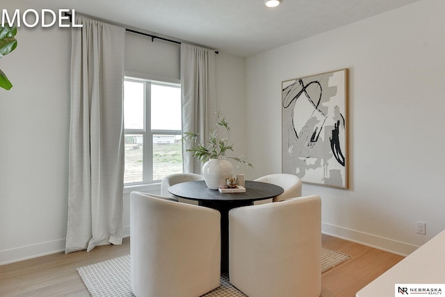 12386 Fenwick St, Papillion, NE 68046 - dining room with light wood-type flooring and baseboards