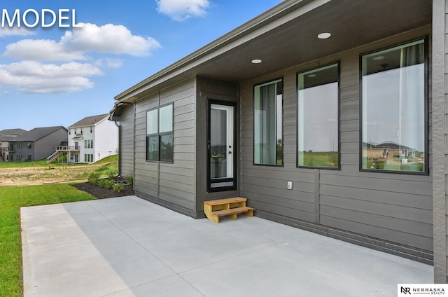 12386 Fenwick St, Papillion, NE 68046 - view of patio with entry steps and a residential view