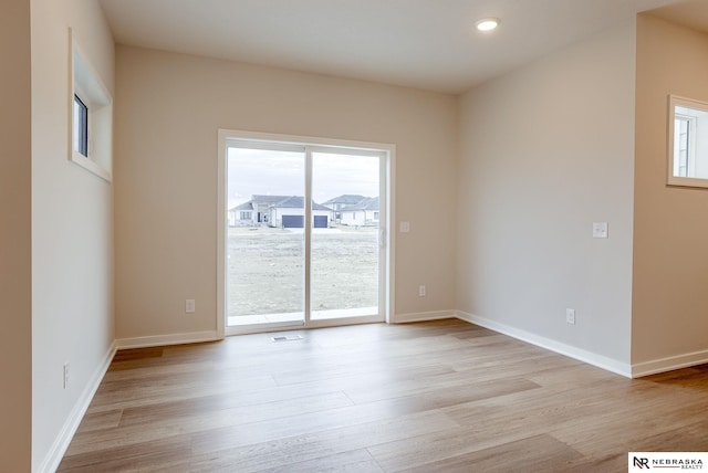 12382 Fenwick St, Papillion, NE 68046 - empty room featuring light wood-style floors and recessed lighting