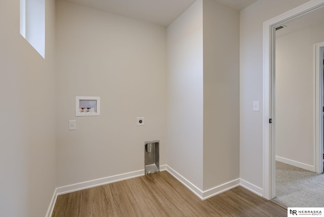 12382 Fenwick St, Papillion, NE 68046 - laundry room with hookup for a washing machine, light wood-style floors, and hookup for an electric dryer