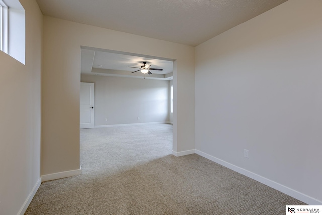 12382 Fenwick St, Papillion, NE 68046 - spare room featuring carpet floors and ceiling fan