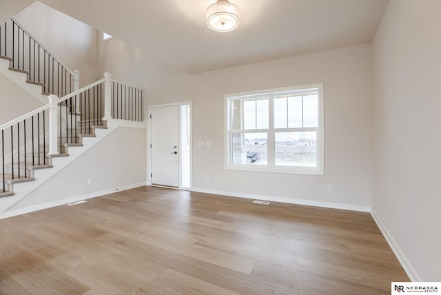 12382 Fenwick St, Papillion, NE 68046 - entrance foyer with stairs and wood finished floors