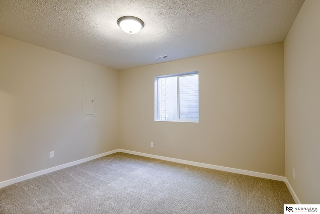 12206 S 113th St, Papillion, NE 68046 - unfurnished room featuring carpet floors and a textured ceiling