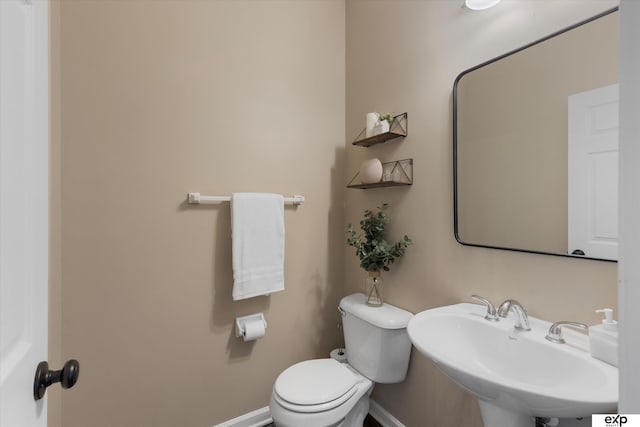 16454 Drexel St, Omaha, NE 68135 - half bathroom featuring a sink and toilet