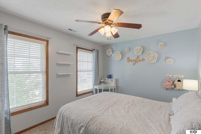 16454 Drexel St, Omaha, NE 68135 - bedroom featuring carpet floors and a ceiling fan