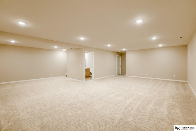 11152 Portage Dr, Papillion, NE 68046 - finished below grade area with recessed lighting and light colored carpet