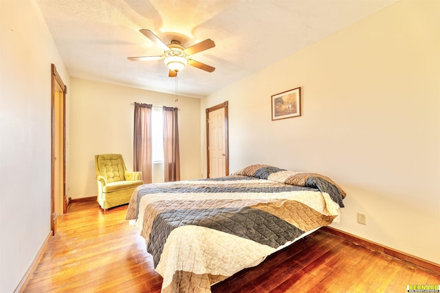 1916 S 42nd Rd, Talmage, NE 68448 - bedroom with light wood-style floors and ceiling fan