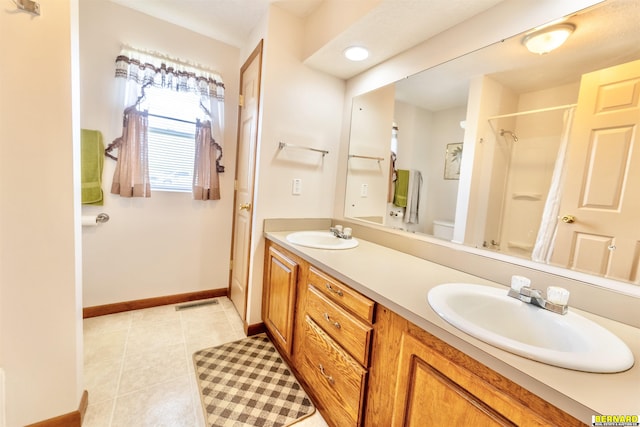 1916 S 42nd Rd, Talmage, NE 68448 - bathroom with double vanity, a shower, and tile patterned flooring