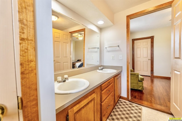 1916 S 42nd Rd, Talmage, NE 68448 - bathroom featuring ensuite bath, double vanity, tile patterned flooring, and recessed lighting