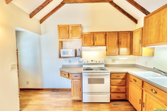 1916 S 42nd Rd, Talmage, NE 68448 - kitchen with white appliances, extractor fan, beam ceiling, light wood-style flooring, and light countertops