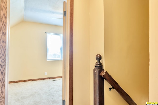 1916 S 42nd Rd, Talmage, NE 68448 - hallway featuring an upstairs landing, carpet, and lofted ceiling