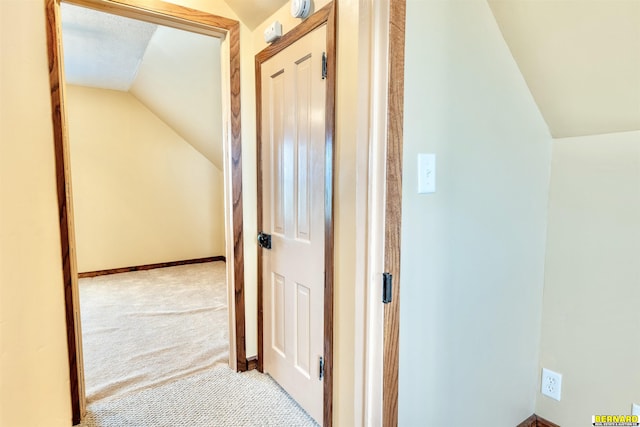 1916 S 42nd Rd, Talmage, NE 68448 - hallway featuring lofted ceiling and carpet flooring