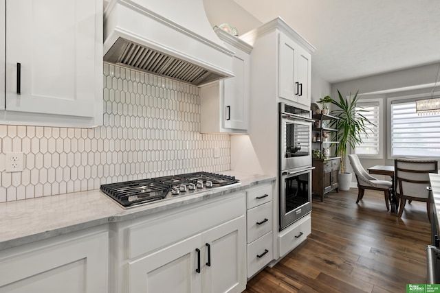 4802 N 187th Ave, Elkhorn, NE 68022 - kitchen with stainless steel appliances, custom exhaust hood, white cabinets, and backsplash