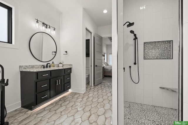 4802 N 187th Ave, Elkhorn, NE 68022 - bathroom featuring walk in shower, vanity, recessed lighting, and ensuite bathroom