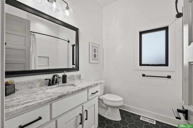 4802 N 187th Ave, Elkhorn, NE 68022 - full bathroom featuring tile patterned flooring, vanity, and a shower with curtain