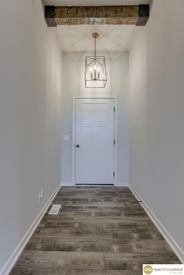 12618 Glenn St, Omaha, NE 68138 - entryway featuring a chandelier and dark wood finished floors